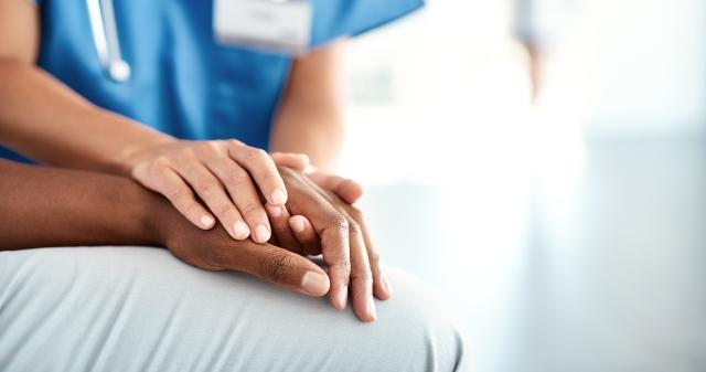 holding patient hand